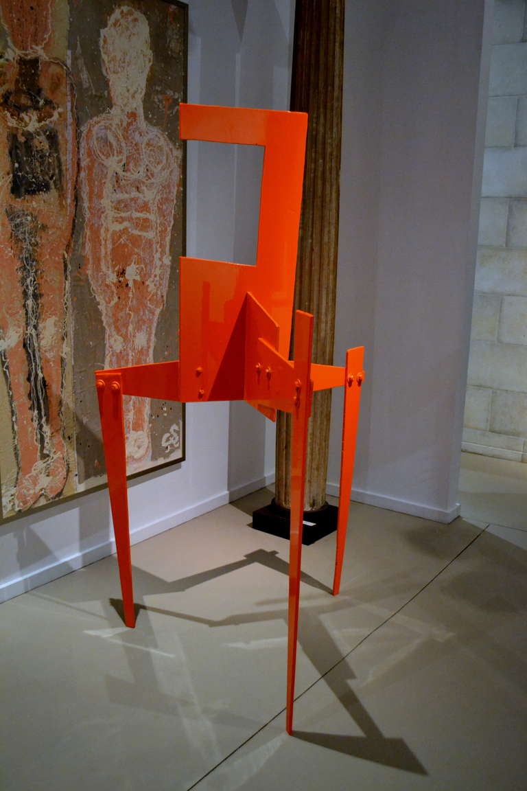 Artist Moira Fain, created this exceptional Calder-esque abstract steel sculpture, that is powder coated in a vibrant shade of orange.  Visually appealing from any perspective.