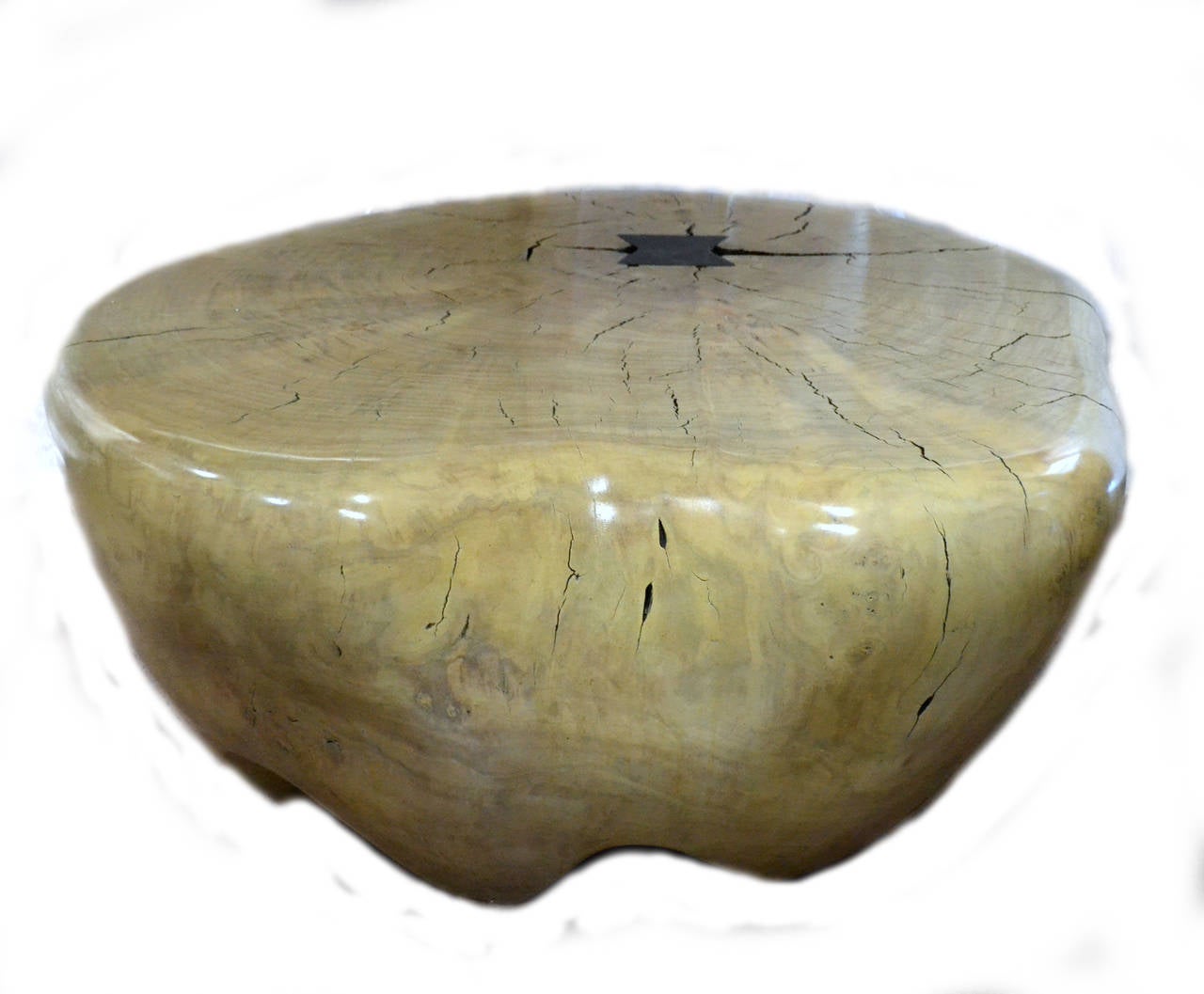It is no wonder that artist Daniel Pollock's (b. 1952) sculptural designs are in such high demand. As in the case of this distinctive and elegant low table, created from cottonwood with an ivory finish and unique form, he uses only reclaimed and
