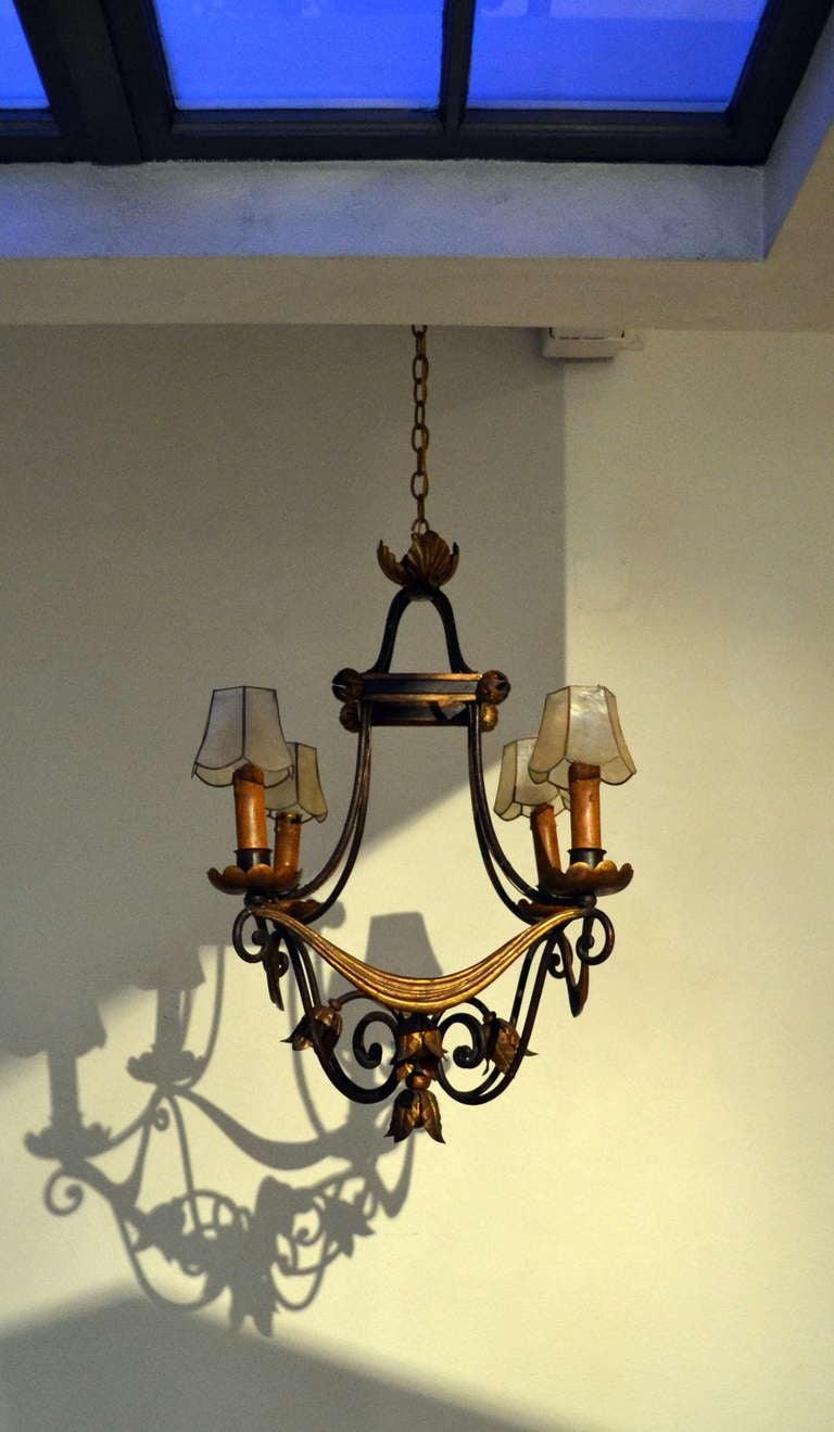 Neoclassical Neoclassic French Iron and Gilt Four Light Chandelier For Sale