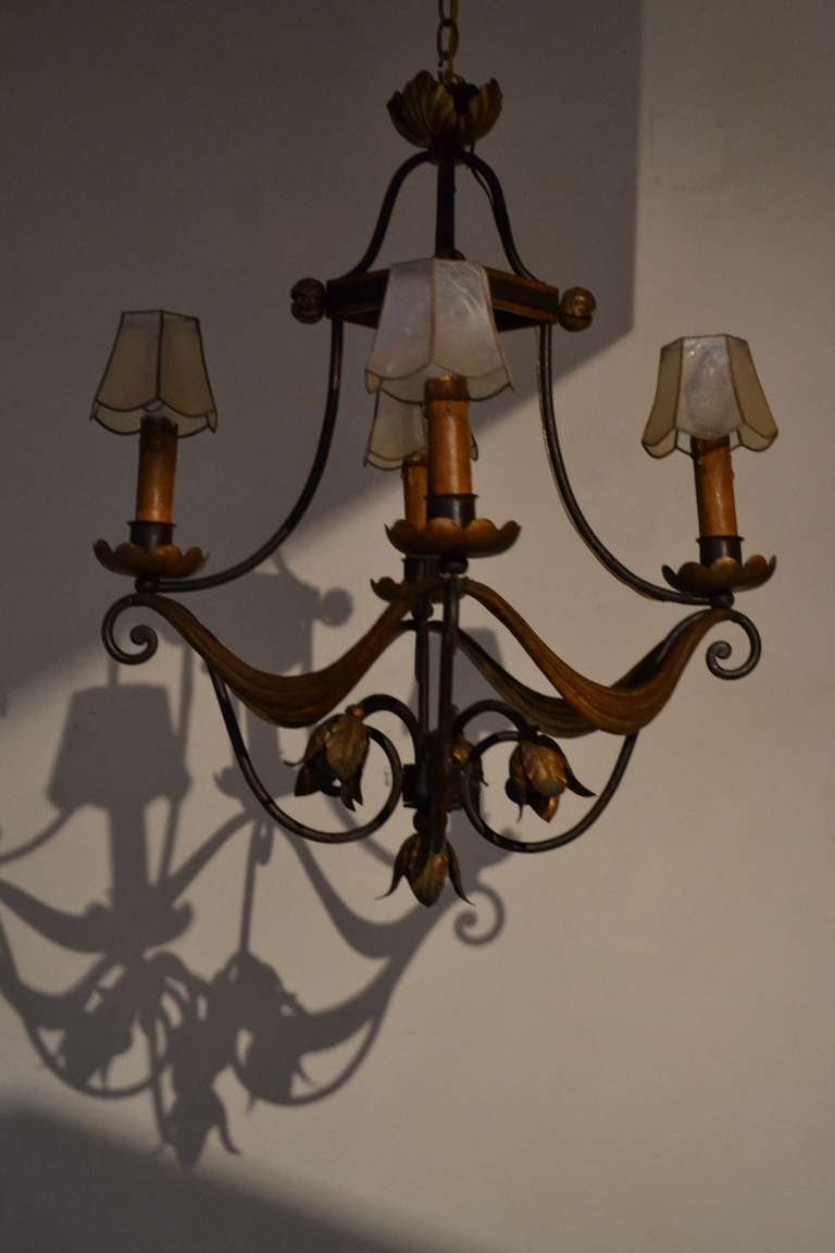 Mid-20th Century Neoclassic French Iron and Gilt Four Light Chandelier For Sale