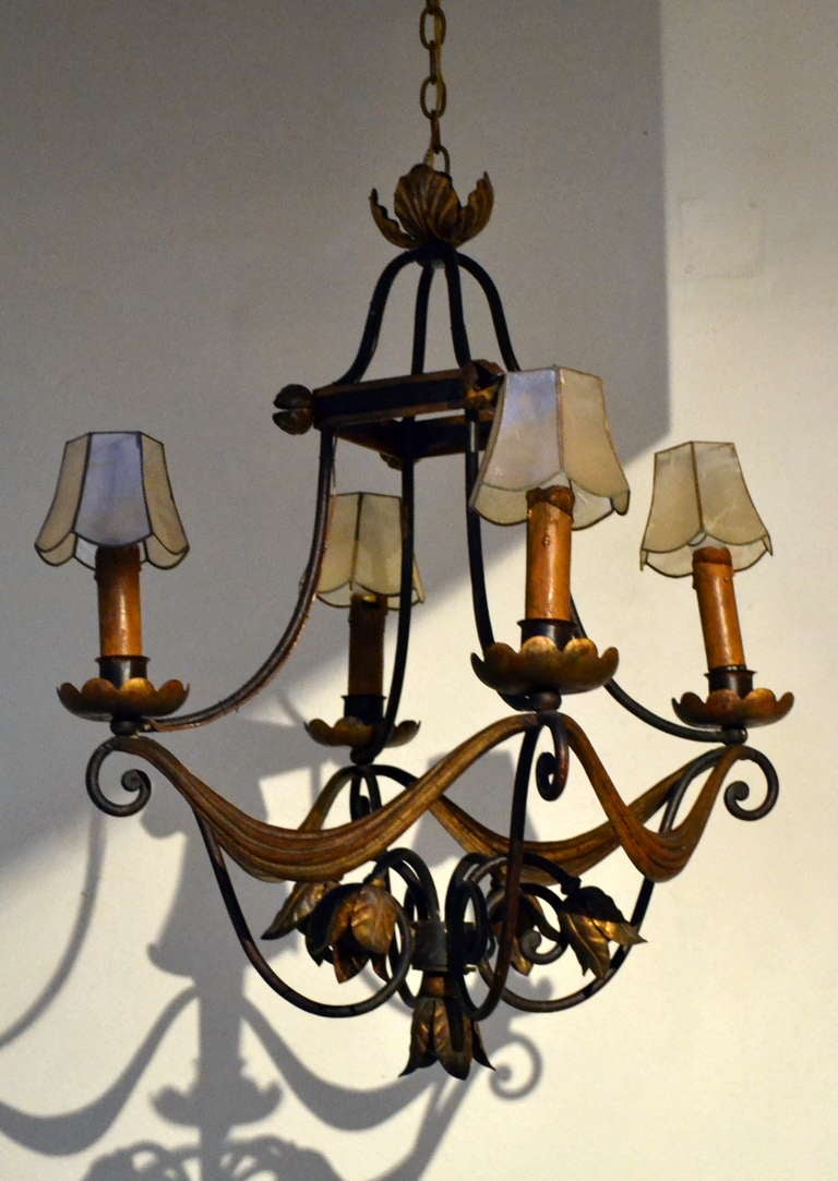 Metal Neoclassic French Iron and Gilt Four Light Chandelier For Sale