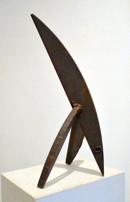 Simple, unique, interesting and powerful describe what you see when looking at this welded steel sculpture.  Titled; “The Whale”, an early work of the artist, signed 