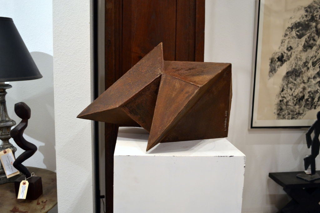 California artist Scott Donadio, (b. 1961) created this geometric abstract by using 16 gauge steel. Designed to be shown on any angle, each position creates an entirely different look (as seen in the photographs provided).<br />
<br />
This