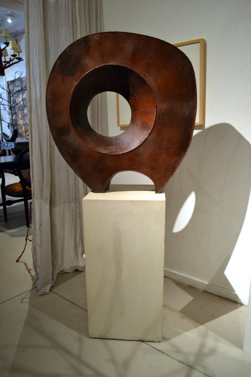 Titled: “Moonshine”. Executed by California artist Scott Donadio, (b. 1961).  For use indoors or outside.  Both 12 and 16 gauge steel was used to construct this abstract sculpture.  The artwork has a protective coating that prevents further