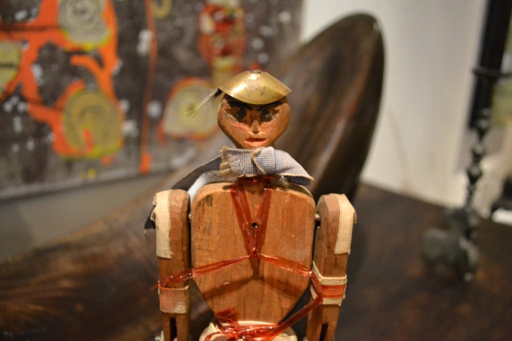 This wonderful figure is actually a hand-carafted wooden Folk-Art Limberjack. Limberjack’s are also known as Jig dolls; they are traditionally made of wood or tin-plate and are used as 'toys' for adults or children. Their limbs are articulated and