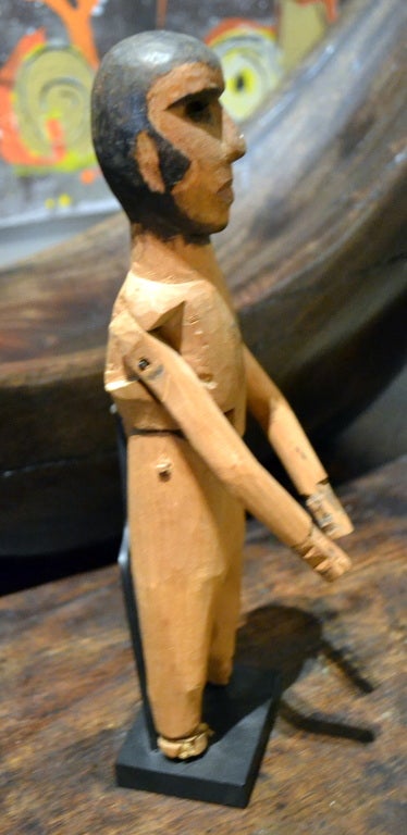 This wonderful figure is actually a hand-carafted wooden Folk-Art Limberjack.  Limberjack’s are also known as Jig dolls; they are traditionally made of wood or tin-plate and are used as 'toys' for adults or children. Their limbs are articulated and
