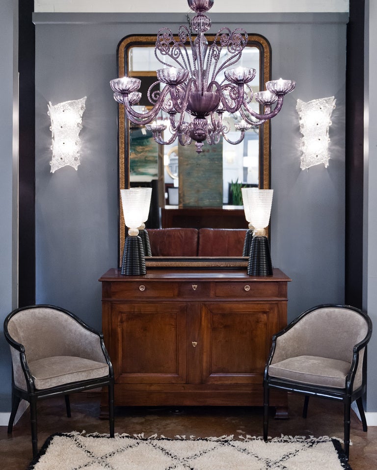 Pair of handblown Murano glass sconces with glass flowers. An intricate and exquisite design. Two medium base lights per sconce, wired to fit US standards.