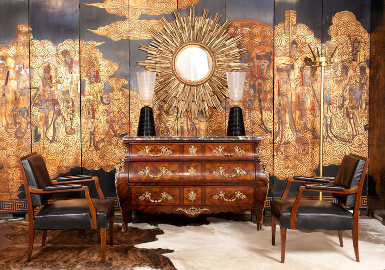 Extraordinary French antique Louis XV style bombé chest of drawers of rosewood, contrasting marquetry & inlays, and a pristine rouge brêche marble top, oak as a secondary wood. Rich decor of Ormoulu bronzes highlight the splendid serpentine curves