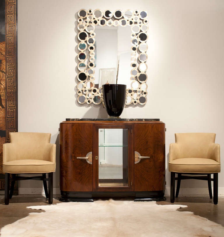 Venetian glass mirror with friezes of blown and ridged glass rings fused with 23-carat gold flecks. Tinted mirrors.
A pair is available, priced per piece.

By Ongaro e Fuga.