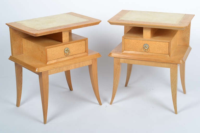 French Art Deco period night stands in maple with goat skin tops, dovetailed drawers, and brass drawer pulls. Elegant and stylish in the manner of André Arbus.