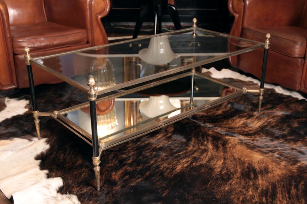 French Art Deco period solid brass and lacquered steel coffee table, nice proportions, fine cast details, wonderful patina. A great classic piece in an unusual size.