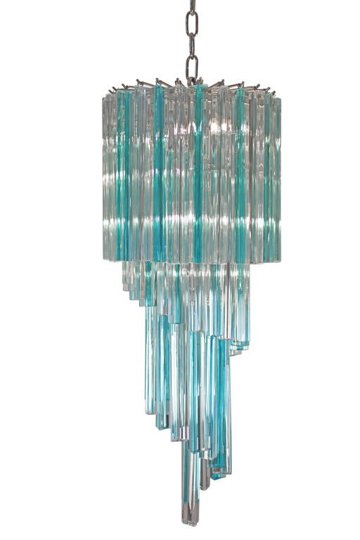 Eye catching Italian vintage Murano glass chandelier with alternating clear and aquamarine colored Murano cristalo glass crystals.  Rewired from the United States.