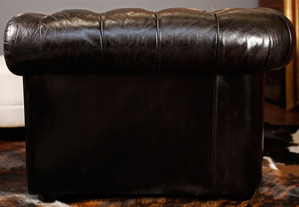 Stunning English Art Deco period Chesterfield sofa in tufted black leather (1st grade supple buffalo hide) all original. Goose down cushions. Great look and very comfortable.