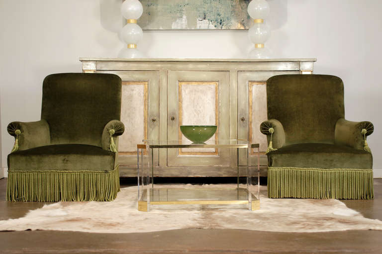French antique Napoleon III period bergeres in green velvet upholstery with matching trim. Seat height is 13.25 in.