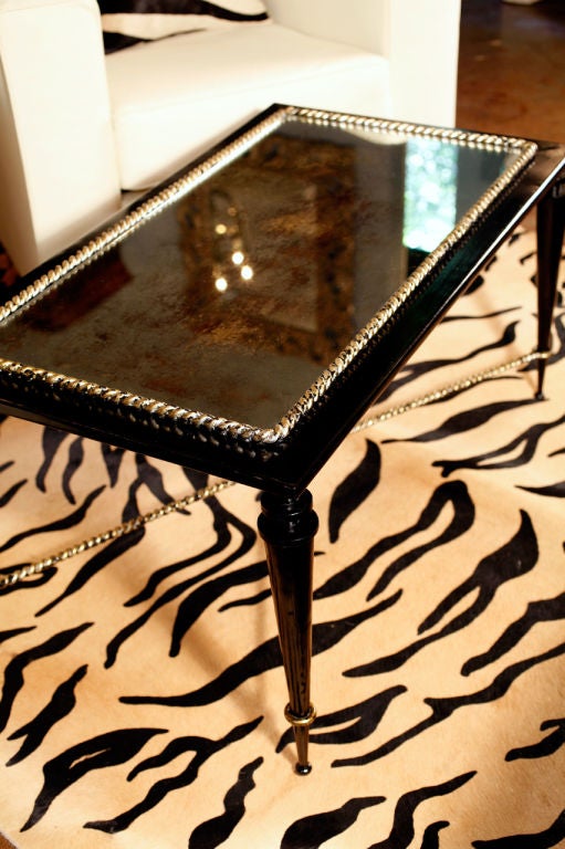 Stunning French coffee table in hand hammered forged iron with gold leafed 