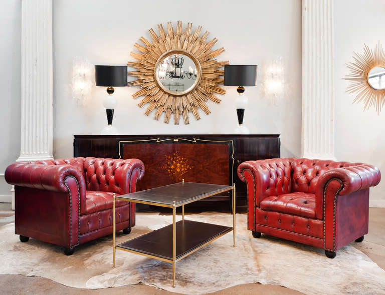 French vintage Hermes leather two-tier coffee table  attributed to Jaques Adnet with gilt brass frame. Black leather shelves are embossed and gold leafed with a Greek key design.
