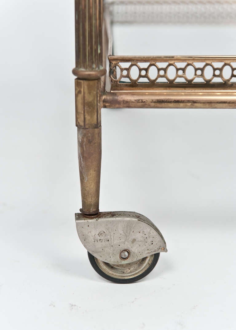 French Vintage Brass and Glass Side Table on Casters at 1stDibs