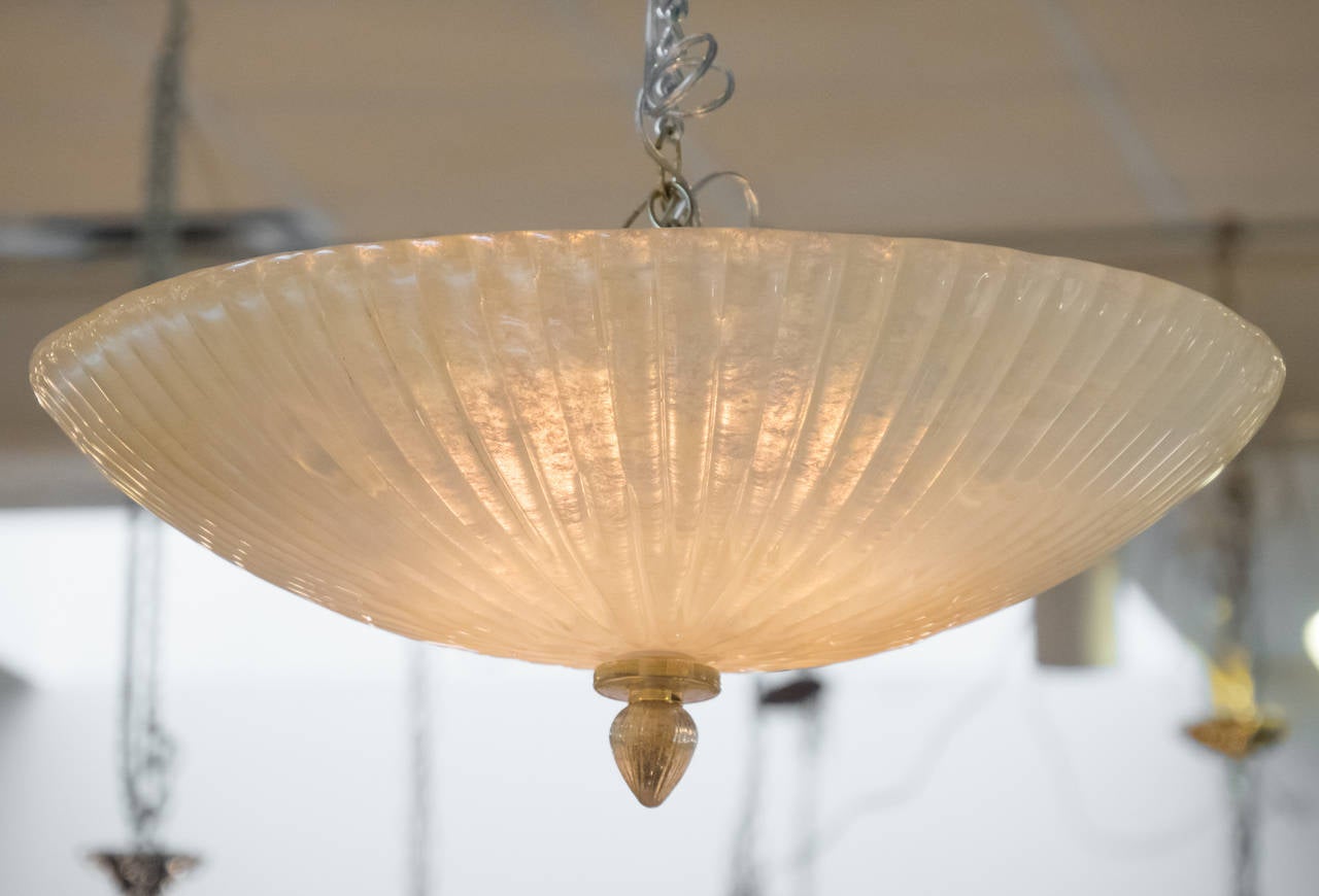 Handblown Murano glass flush mount ceiling fixture in a beautifully ridged, frosted glass. Glass finial with "polvere d'oro" (23-karat gold flecks) throughout. Rewired for the US market, holds four medium base bulbs.