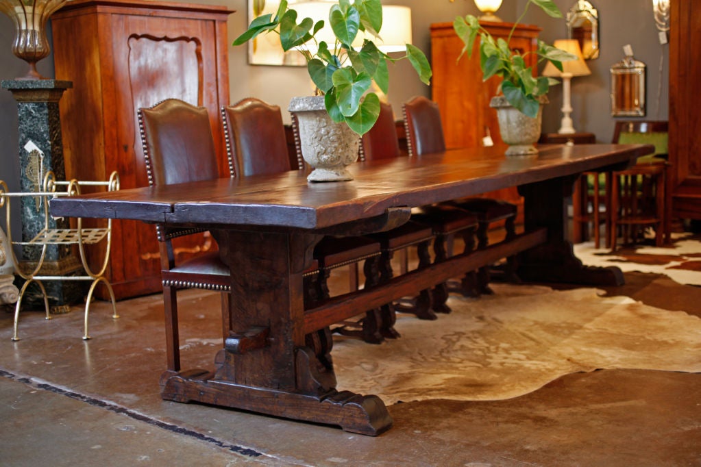 Spectacular dining room table from a monastery in Portugal, the top is crafted in two full length mahogany slabs (2 inches thick), the base is made of chestnut. Mahogany was a novelty in the 1700s, brought back from Brazil in the mid-1600s, it