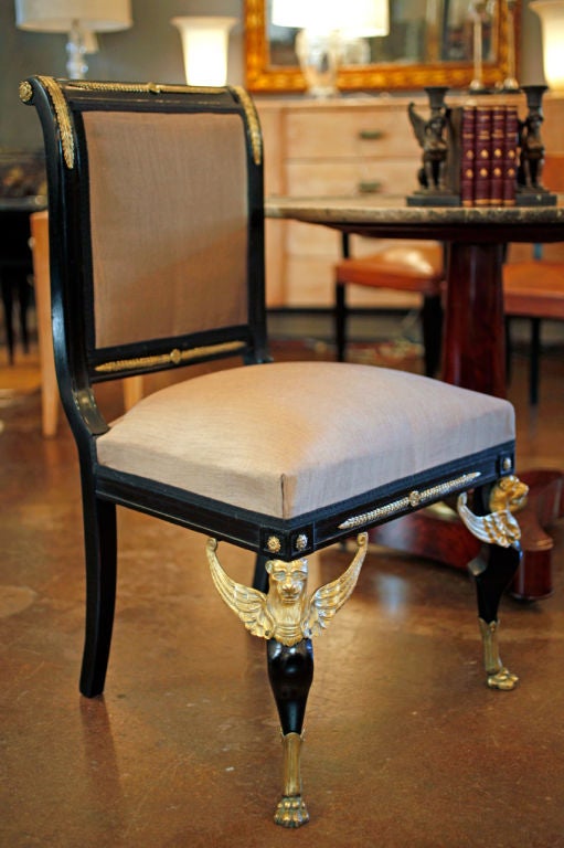 Beautiful pair of ebonized chairs with rich 