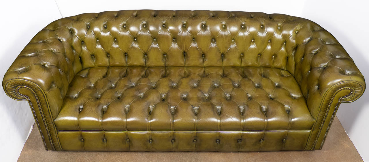vintage green leather sofa