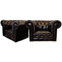 Pair of Important Black Leather Chesterfield Armchairs