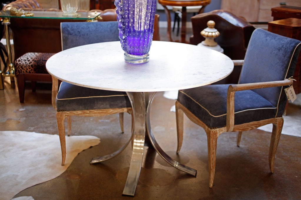 KNOLL  style quadruped chrome table with Carrara marble top. An excellent mid-century find.