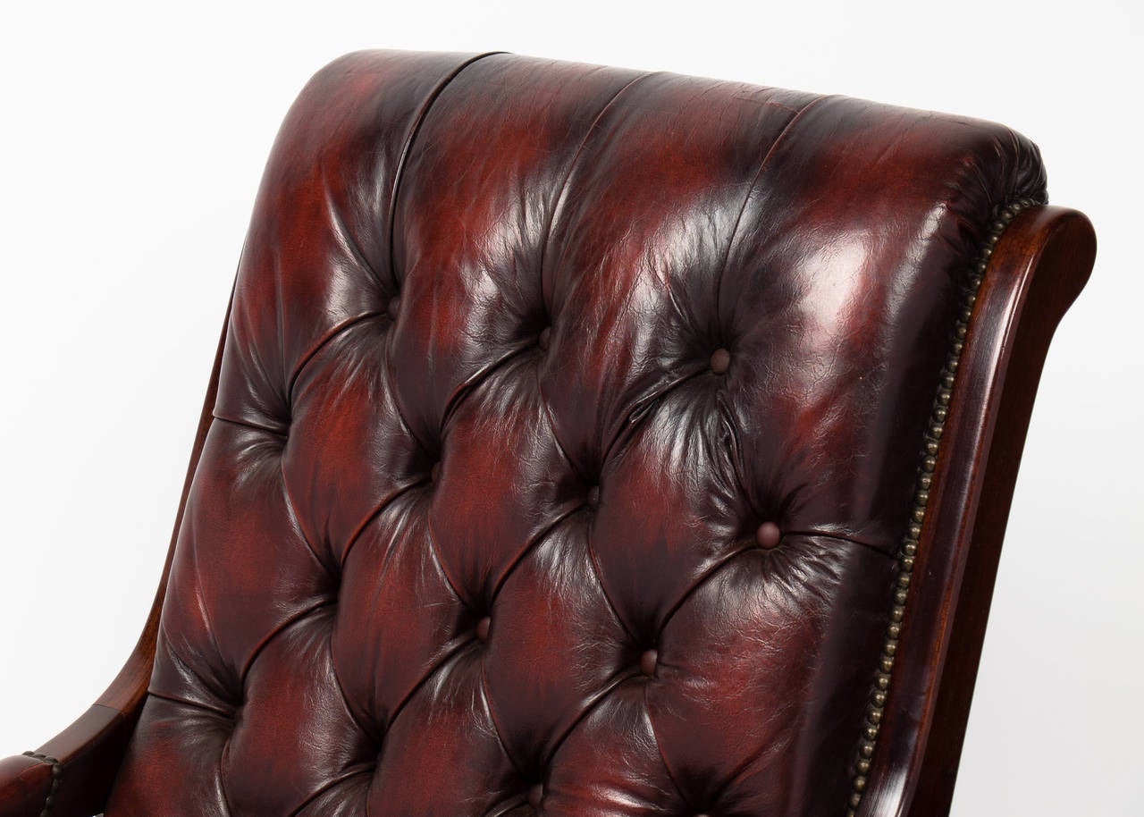 Polished French Vintage Tufted Leather and Mahogany Rocking Chair