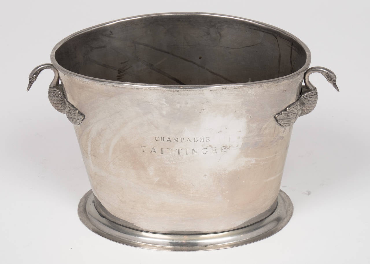 French vintage silver plated champagne bucket featuring finely cast swans as handles and 