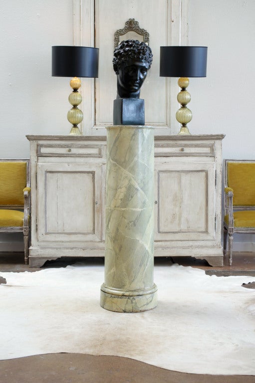 Hand painted fir column with a faux marble finish, signed 