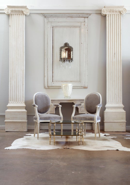 French antique pair of hand painted and hand carved oak pilasters with Ionic capitals.