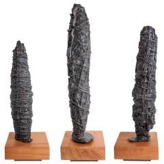 "Constricted 1, 2, 
3" Sculptures by Marissa Starr