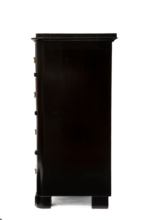 Antique Austrian chest of drawers, ebonized and French polished, with bronze hardware and four dovetailed drawers.