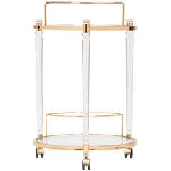 Midcentury Bar Cart in Lucite
Gilt Brass Midcentury Bar Cart in Lucite
Gilt Brass