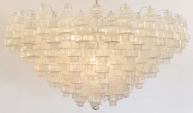 A stunning Murano glass chandelier with six tiers of unique 
