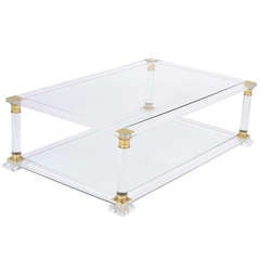French Neoclassic Lucite 
Gilt Brass Coffee Table
