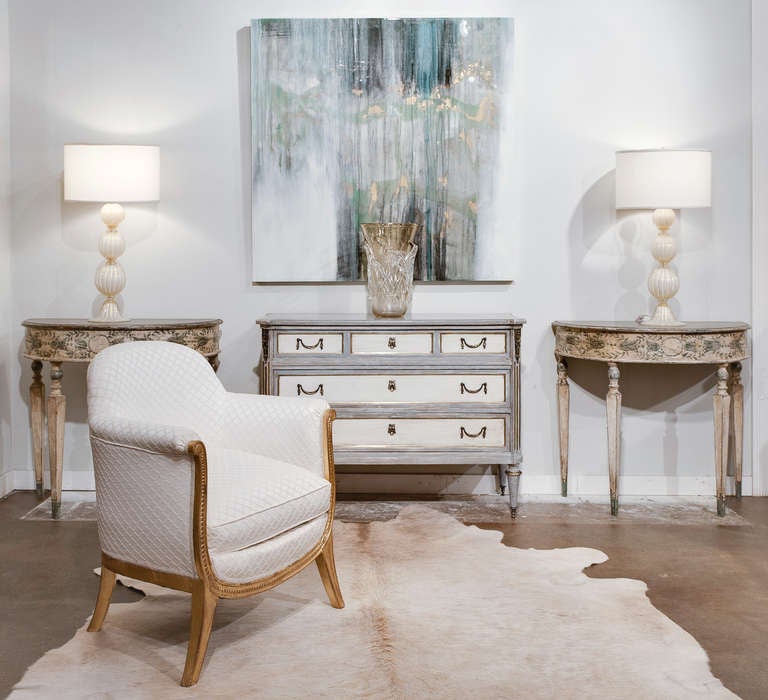 French Art Deco bergêre, in the manner of Rene Drouet, with hand carved  gold leafed frame. Professionally reupholstered. Seat height is 16.5 in. Flawless design for a very comfortable seating.