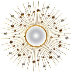 Miroir Sunburst en fer feuille d'or avec pierres précieuses