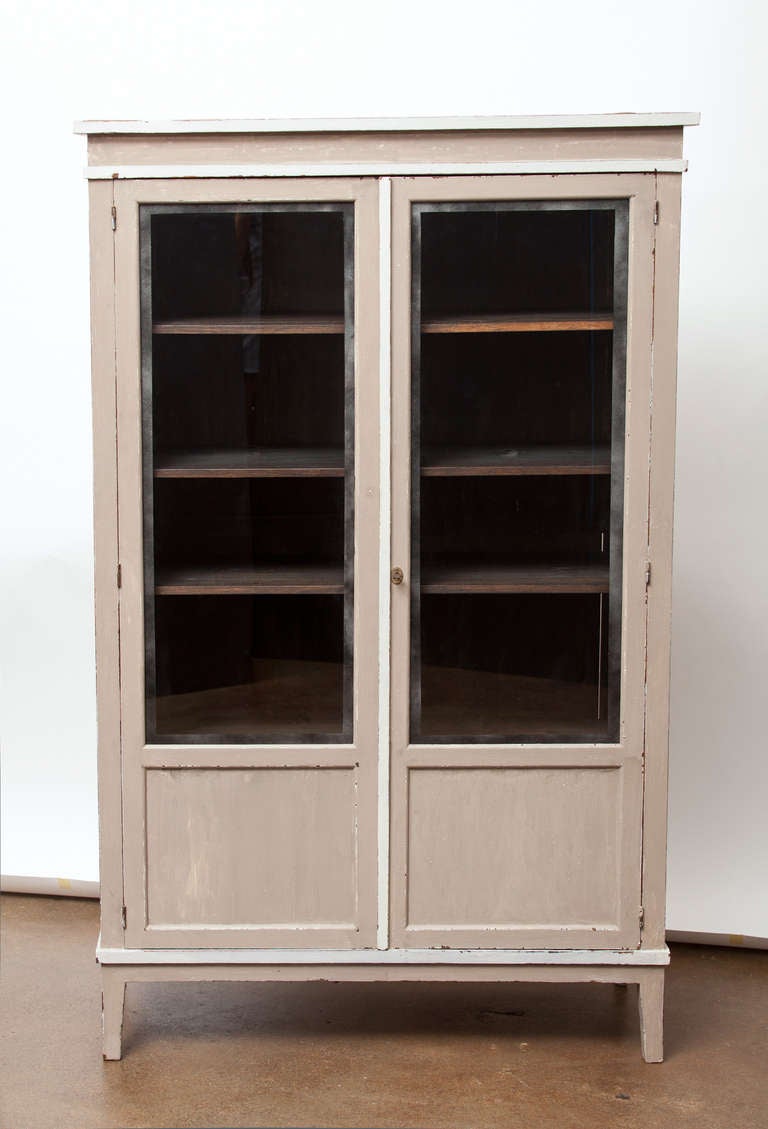 Antique French Directoire style bookcase with glass front doors and adjustable interior shelves. Very nice peg construction, we loved the lines, the beautiful proportions and the 1920 key ...