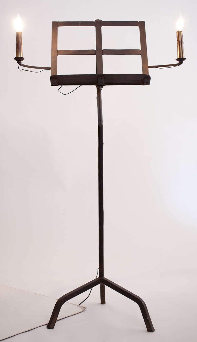 Antique French forged iron music stand with two candelabra lights (wired for the US).