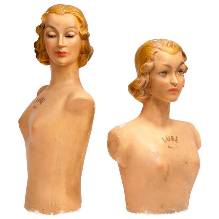 French vintage plaster mannequin busts by Lubé Paris. Two are available, priced per item. Dimensions listed are for the larger mannequin. The smaller one is 23.75