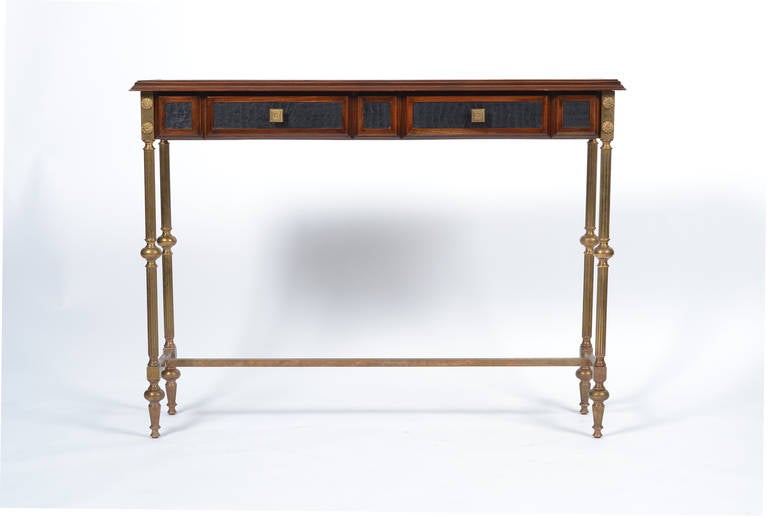 French vintage console table by Maison Raphael, with a sensuous juxtaposition of gilt brass, mahogany, and alligator skin embossed leather.