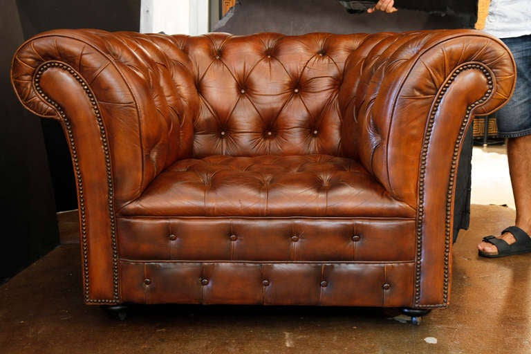 From England, original leather Chesterfield club chairs, gorgeous patina, very comfortable and strong.