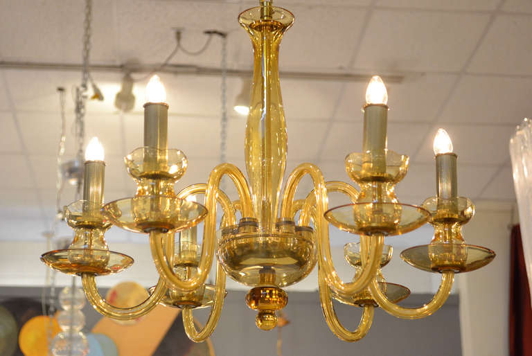 Italian Murano amber glass chandelier with six branches. Six candelabra lights, rewired for the US.