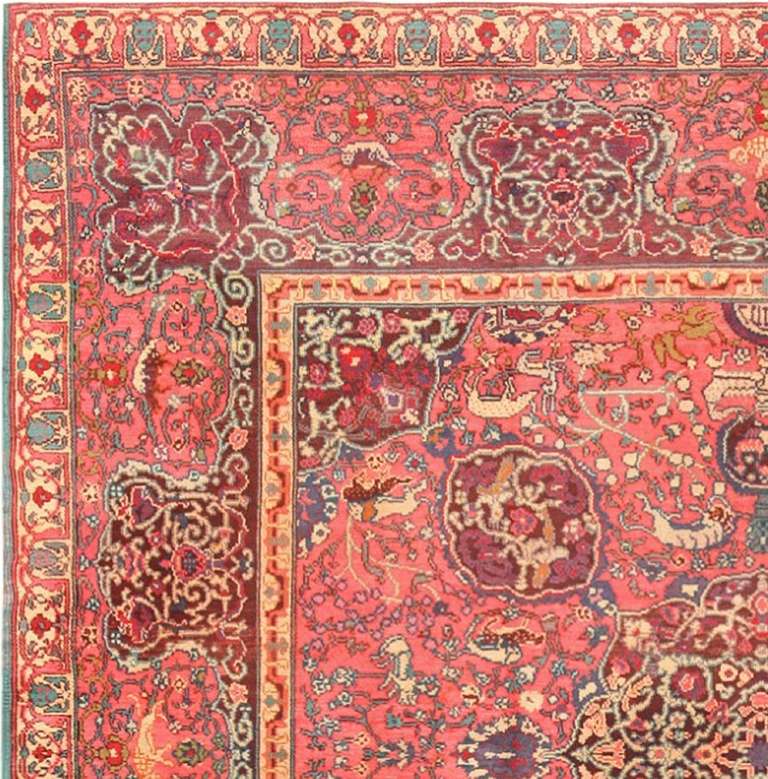 This dazzling Emperor's-style carpet is alive with artistic influences from Europe, the Mediterranean and the Mid East, which all had a powerful effect on Israel's artistic community. The lush mulberry and aubergine field and complementary borders