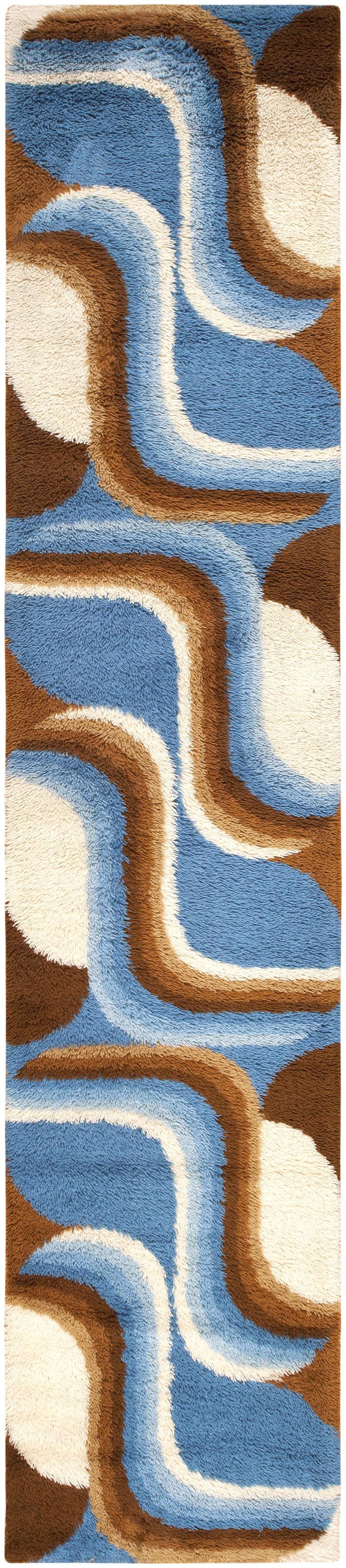 Swedish rug, Scandinavia, mid-20th century, this mod Mid-Century Swedish deco rug epitomizes the pop-art style. The wildly decorated field displays streamlined polychrome waves set on a background of abstract monochromatic segments that feature the