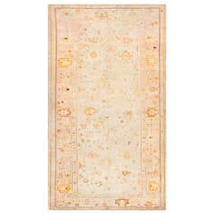 Elegant Large Antique Ivory Oushak Rug