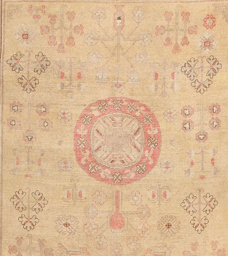 Antique Khotan Rugs - Antique rugs from the city of Khotan have a style that is all their own. These exceptional rugs make the legends of Marco Polo and the Silk Road come alive. Khotan is an oasis and an age-old center for international design.