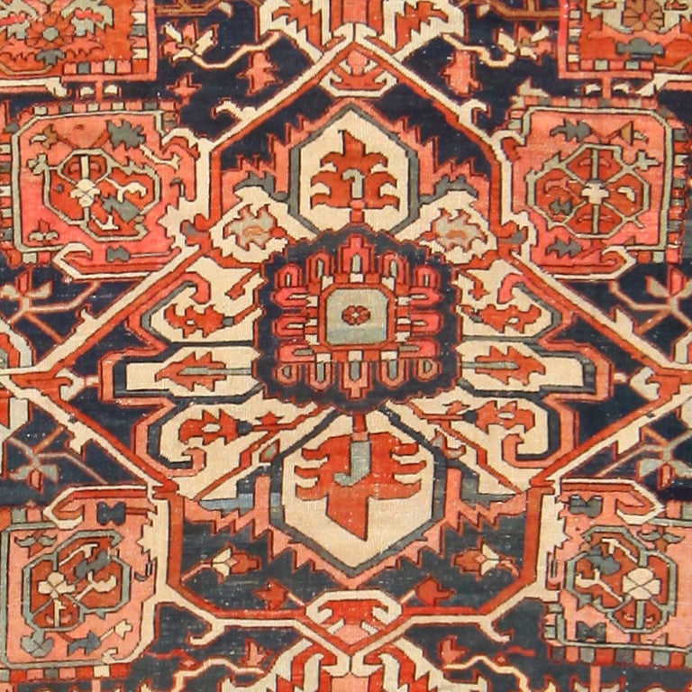Antique Persian Serapi rug, Origin: Persia, circa turn of the 20th century. Here is a beautiful antique oriental rug, an antique Serapi rug that was woven in Persia around the turn of the 20th century. Possessed by a rich and traditional design and