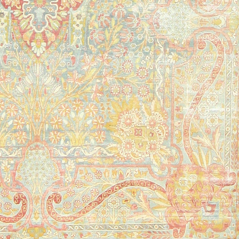 Antique Persian Kerman carpet, origin: Persia, circa turn of the 20th century. Here is a unique and delightful antique oriental rug, an antique Kerman carpet that was woven in Persia around the turn of the 20th century. Extraordinary throughout,